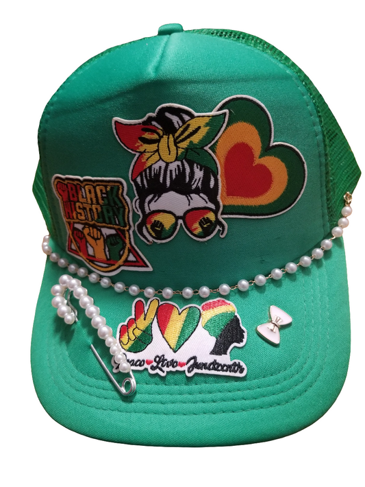 SHESHE JUNETEENTH TRUCKER HAT.
